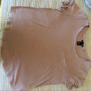 Basic H&M’ small blush pink pocket shirt.